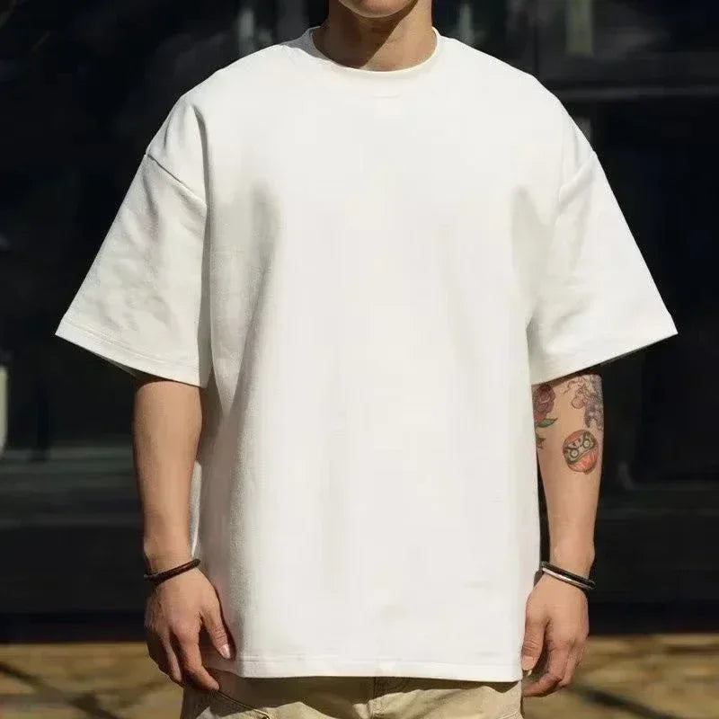 Minimalist Tee for Men Black Cotton Oversized Silhouette Designer Streetwear Breathable ComfortableEssential SummerWardrobePiece